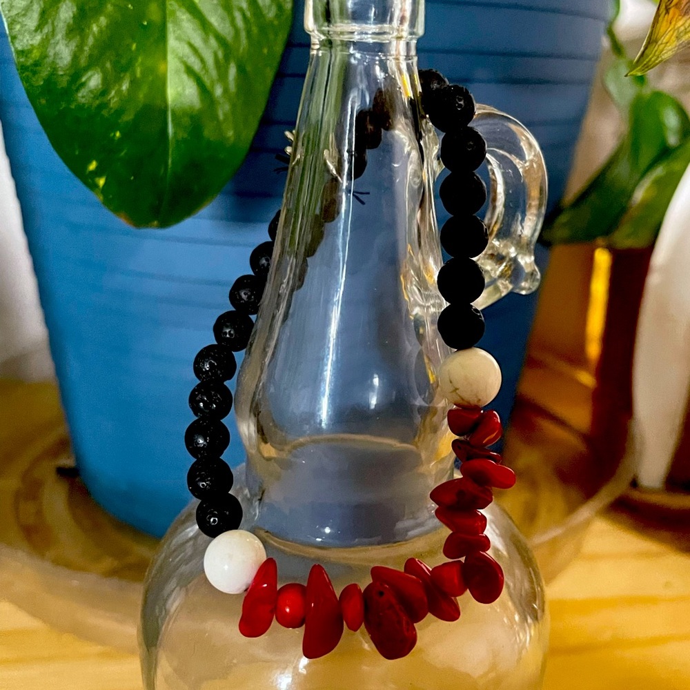 Red jasper and lava stone beaded bracelet